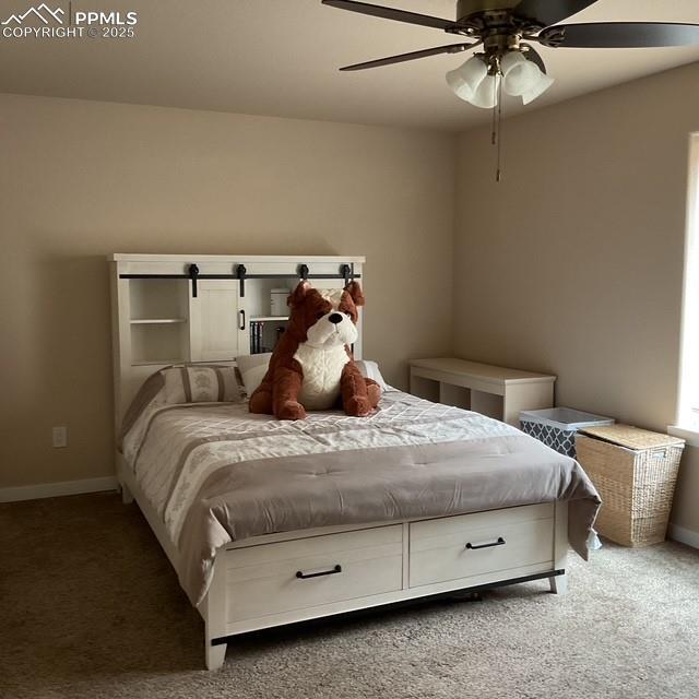 71 Mt Elbert Dr, Florissant, CO 80816 - bedroom with carpet floors, baseboards, and a ceiling fan