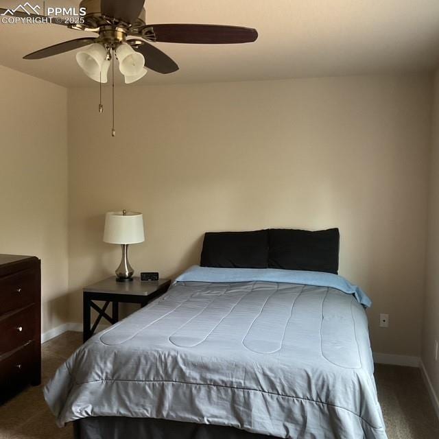 71 Mt Elbert Dr, Florissant, CO 80816 - bedroom featuring baseboards, carpet, and a ceiling fan