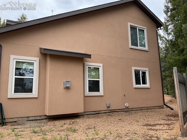 71 Mt Elbert Dr, Florissant, CO 80816 - view of side of property featuring stucco siding