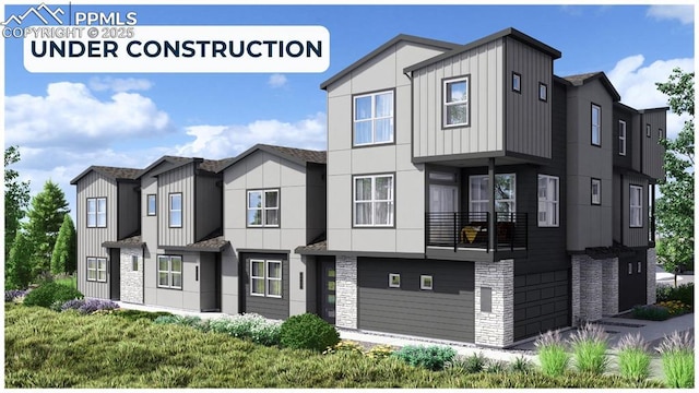 3366 Sobo Vw, Colorado Springs, CO 80907 - view of front of property with board and batten siding, a balcony, a garage, and stone siding