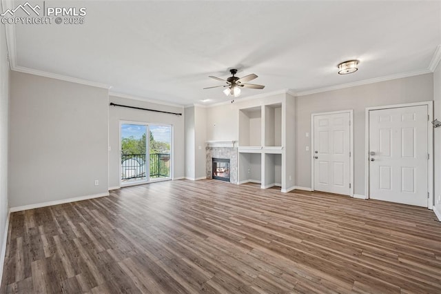 4807 Kerry Lynn Vw Unit 102, Colorado Springs, CO 80922 - unfurnished living room featuring a ceiling fan, wood finished floors, ornamental molding, and baseboards