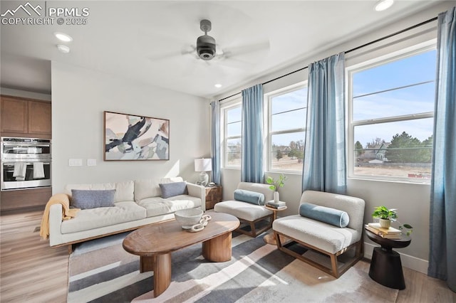 3077 Curly Grv, Colorado Springs, CO 80922 - living area featuring a ceiling fan, light wood-type flooring, recessed lighting, and baseboards