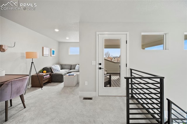 3077 Curly Grv, Colorado Springs, CO 80922 - carpeted living room with baseboards and recessed lighting