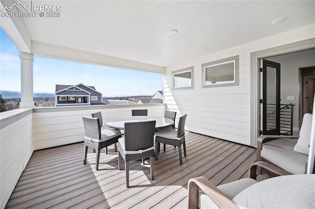 3077 Curly Grv, Colorado Springs, CO 80922 - wooden terrace with outdoor dining area