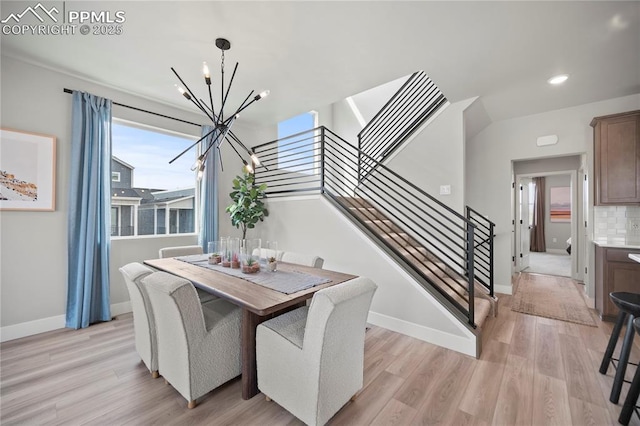 3071 Curly Grv, Colorado Springs, CO 80922 - dining room with a chandelier, stairway, light wood-type flooring, baseboards, and recessed lighting
