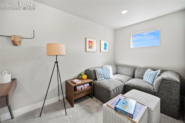 3071 Curly Grv, Colorado Springs, CO 80922 - living room with light colored carpet, baseboards, and recessed lighting