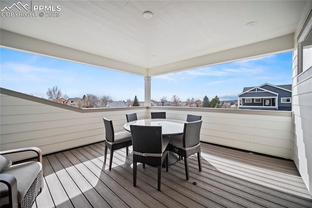 3071 Curly Grv, Colorado Springs, CO 80922 - wooden terrace featuring outdoor dining space