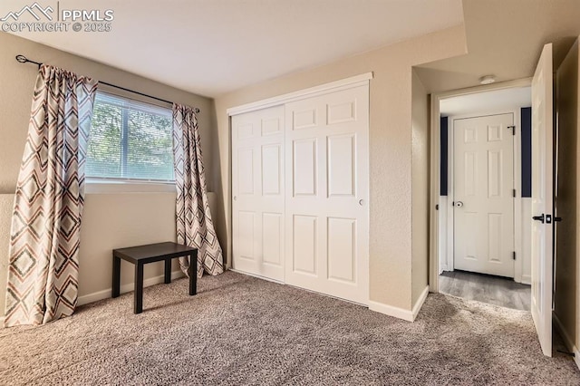 3566 Verde Dr, Colorado Springs, CO 80910 - unfurnished bedroom with carpet floors, a closet, and baseboards