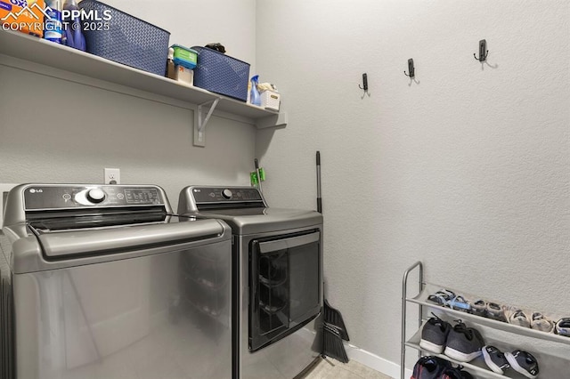10192 Kentwood Dr, Colorado Springs, CO 80924 - laundry area with separate washer and dryer and baseboards