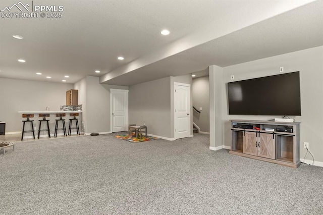 10192 Kentwood Dr, Colorado Springs, CO 80924 - playroom with bar with sink, baseboards, recessed lighting, and carpet floors