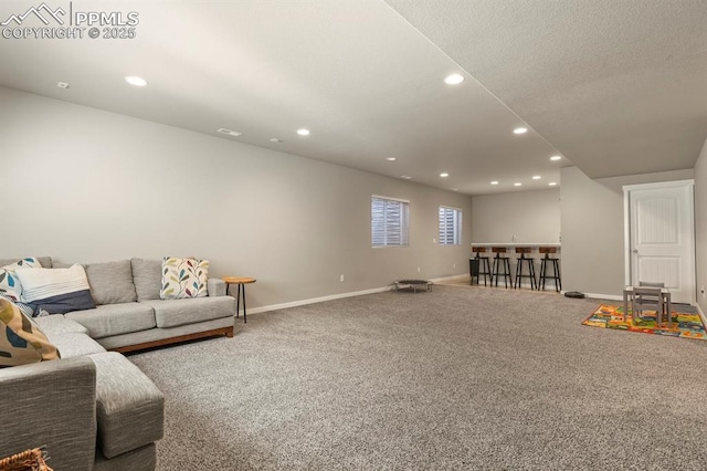 10192 Kentwood Dr, Colorado Springs, CO 80924 - carpeted living room with recessed lighting and baseboards
