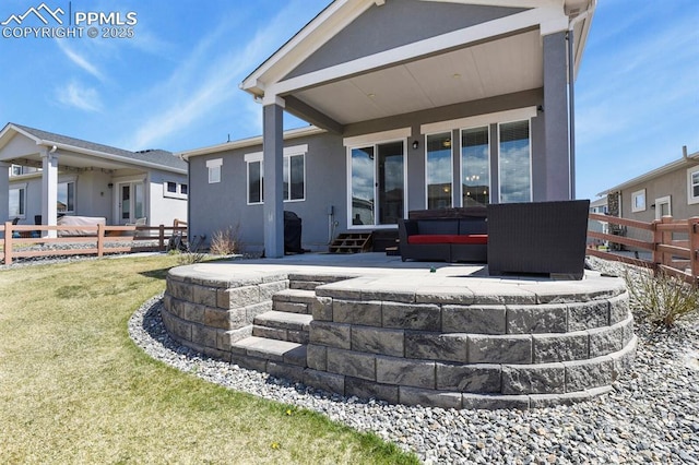 10192 Kentwood Dr, Colorado Springs, CO 80924 - rear view of property with entry steps, stucco siding, and a patio
