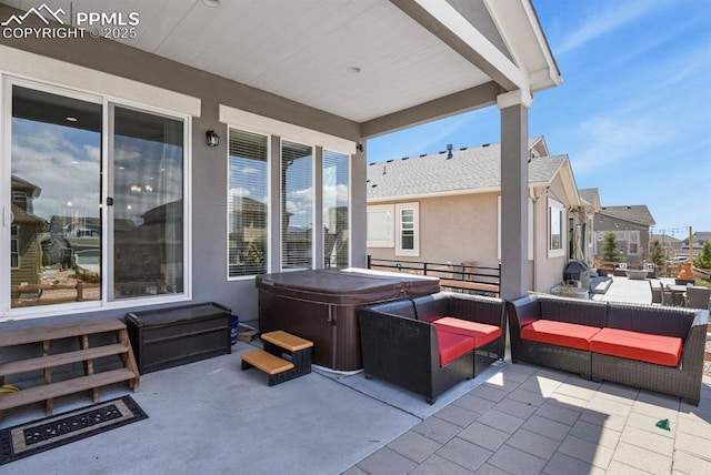 10192 Kentwood Dr, Colorado Springs, CO 80924 - view of patio / terrace with a hot tub, an outdoor living space, and a residential view
