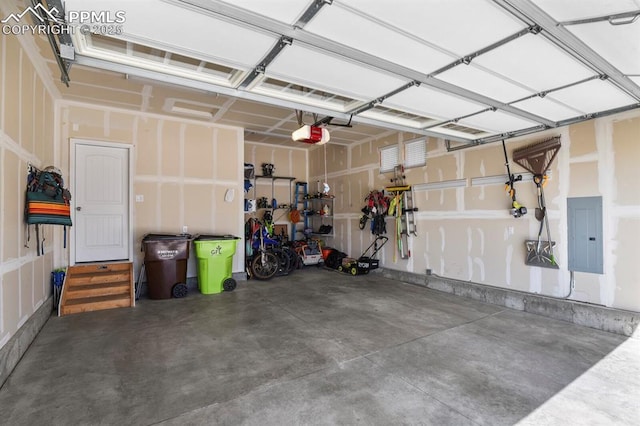 10192 Kentwood Dr, Colorado Springs, CO 80924 - garage with electric panel and a garage door opener