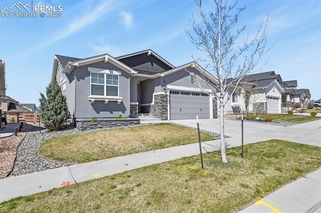 10192 Kentwood Dr, Colorado Springs, CO 80924 - view of front facade featuring stucco siding, an attached garage, driveway, a front yard, and stone siding