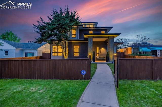 2625 Steele St, Denver, CO 80205 - view of front of house with brick siding and a gate