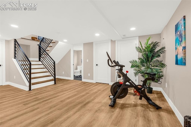 2625 Steele St, Denver, CO 80205 - exercise room featuring light wood-style floors, baseboards, and recessed lighting