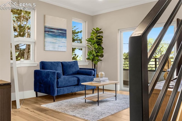 2625 Steele St, Denver, CO 80205 - living area with light wood-style floors, ornamental molding, stairs, and baseboards