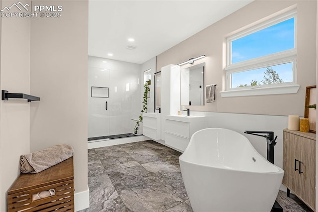 2625 Steele St, Denver, CO 80205 - bathroom featuring vanity, a stall shower, a soaking tub, and recessed lighting