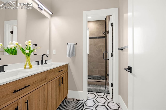 2625 Steele St, Denver, CO 80205 - bathroom with baseboards, double vanity, a stall shower, and tile patterned floors
