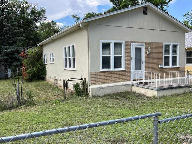 228 N Hancock Ave, Colorado Springs, CO 80903 - view of bungalow-style home