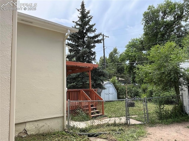228 N Hancock Ave, Colorado Springs, CO 80903 - view of yard featuring a gate and a pergola