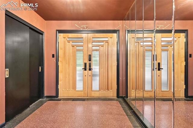 312 Lake Ave, Colorado Springs, CO 80906 - doorway with french doors and baseboards