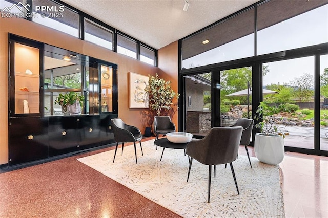 312 Lake Ave, Colorado Springs, CO 80906 - building lobby featuring a wall of windows and a towering ceiling