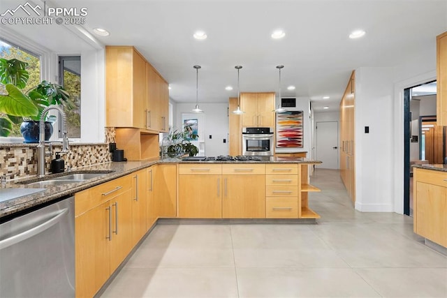 312 Lake Ave, Colorado Springs, CO 80906 - kitchen with appliances with stainless steel finishes, a sink, light brown cabinetry, dark stone countertops, and recessed lighting