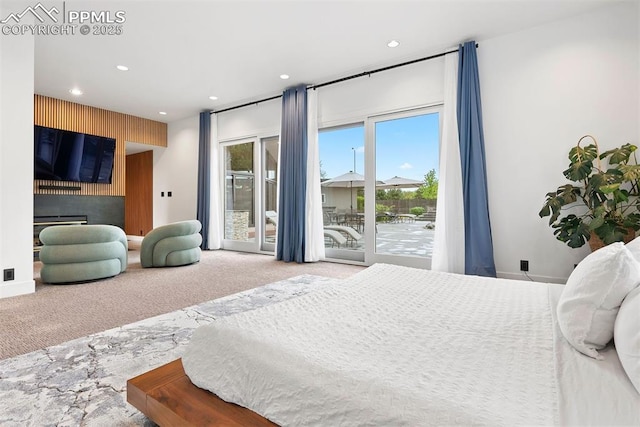 312 Lake Ave, Colorado Springs, CO 80906 - carpeted bedroom with access to exterior, recessed lighting, and a fireplace