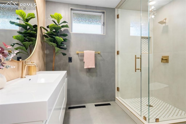312 Lake Ave, Colorado Springs, CO 80906 - bathroom with a shower stall and vanity