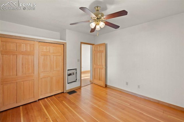 229 E Washington St, Colorado Springs, CO 80907 - unfurnished bedroom featuring light wood finished floors, baseboards, ceiling fan, and a closet
