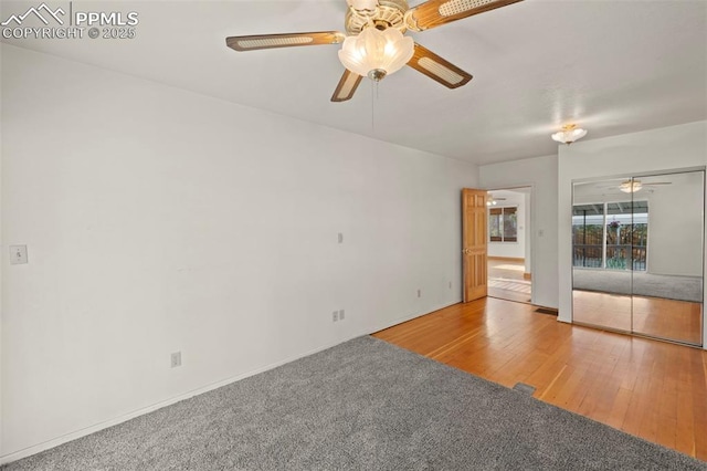 229 E Washington St, Colorado Springs, CO 80907 - empty room featuring ceiling fan and wood finished floors
