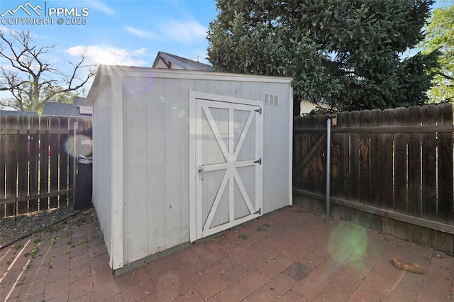 229 E Washington St, Colorado Springs, CO 80907 - view of shed with a fenced backyard