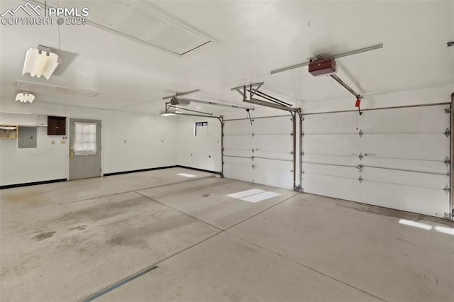 229 E Washington St, Colorado Springs, CO 80907 - garage with electric panel and a garage door opener