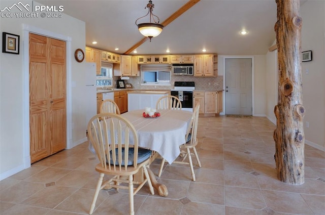 610 Matterhorn Cir, Westcliffe, CO 81252 - dining room featuring recessed lighting, baseboards, light tile patterned flooring, and lofted ceiling