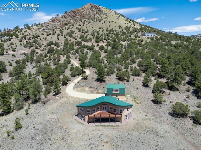 610 Matterhorn Cir, Westcliffe, CO 81252 - aerial view of property and surrounding area with mountains and a desert landscape