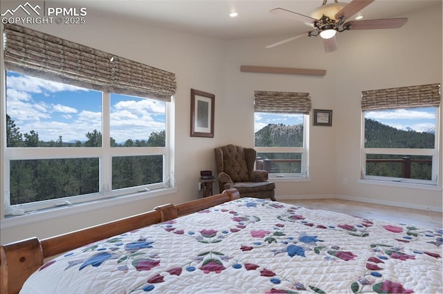 610 Matterhorn Cir, Westcliffe, CO 81252 - bedroom with recessed lighting, baseboards, light tile patterned flooring, and ceiling fan