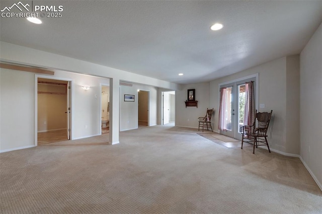 610 Matterhorn Cir, Westcliffe, CO 81252 - living area with french doors, carpet flooring, baseboards, and recessed lighting