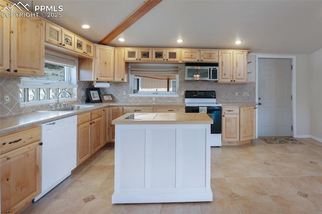610 Matterhorn Cir, Westcliffe, CO 81252 - kitchen with stainless steel microwave, dishwasher, range with electric stovetop, light brown cabinetry, and a sink