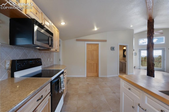 610 Matterhorn Cir, Westcliffe, CO 81252 - kitchen with range with electric stovetop, stainless steel microwave, vaulted ceiling, tasteful backsplash, and recessed lighting