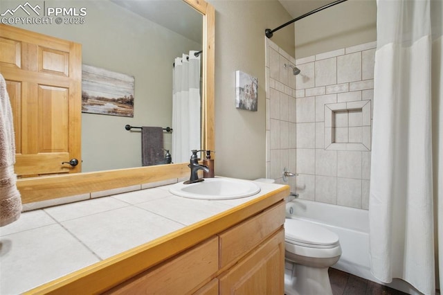 20190 Deer Shadow Way, Monument, CO 80132 - full bathroom featuring shower / bath combination with curtain, toilet, vanity, and wood finished floors
