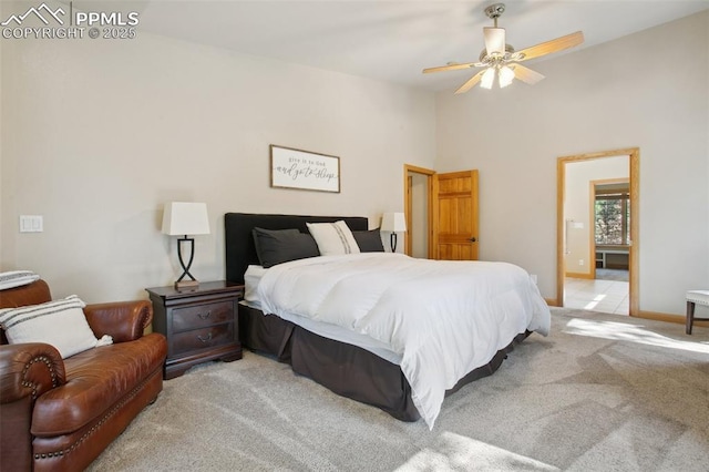 20190 Deer Shadow Way, Monument, CO 80132 - bedroom with light carpet, baseboards, and lofted ceiling