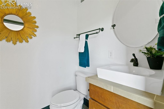 16030 Alta Plaza Cir, Peyton, CO 80831 - bathroom with toilet and vanity