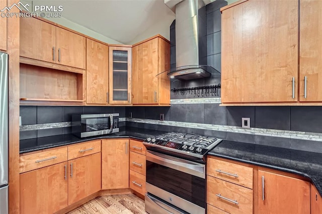 2252 Conservatory Pt, Colorado Springs, CO 80918 - kitchen with appliances with stainless steel finishes, wall chimney exhaust hood, backsplash, glass insert cabinets, and dark stone countertops