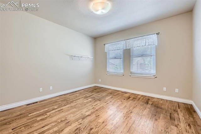 2252 Conservatory Pt, Colorado Springs, CO 80918 - spare room with baseboards and wood finished floors