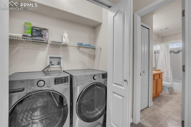 12572 Catch Pen Rd, Peyton, CO 80831 - washroom with washing machine and clothes dryer