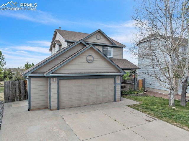 12572 Catch Pen Rd, Peyton, CO 80831 - traditional-style house with a garage and a shingled roof