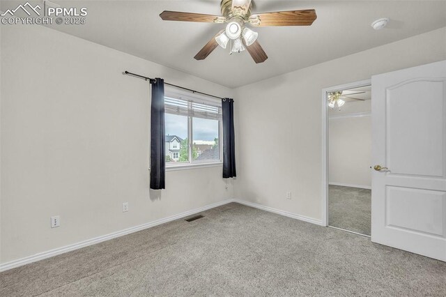 12572 Catch Pen Rd, Peyton, CO 80831 - unfurnished bedroom featuring carpet floors, a closet, baseboards, and ceiling fan