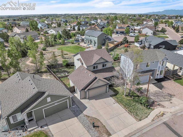12572 Catch Pen Rd, Peyton, CO 80831 - aerial perspective of suburban area featuring a mountain backdrop